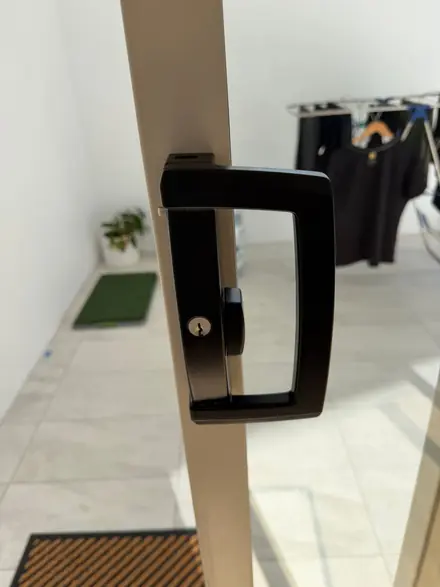 Sliding door lock replacement on a Brisbane home